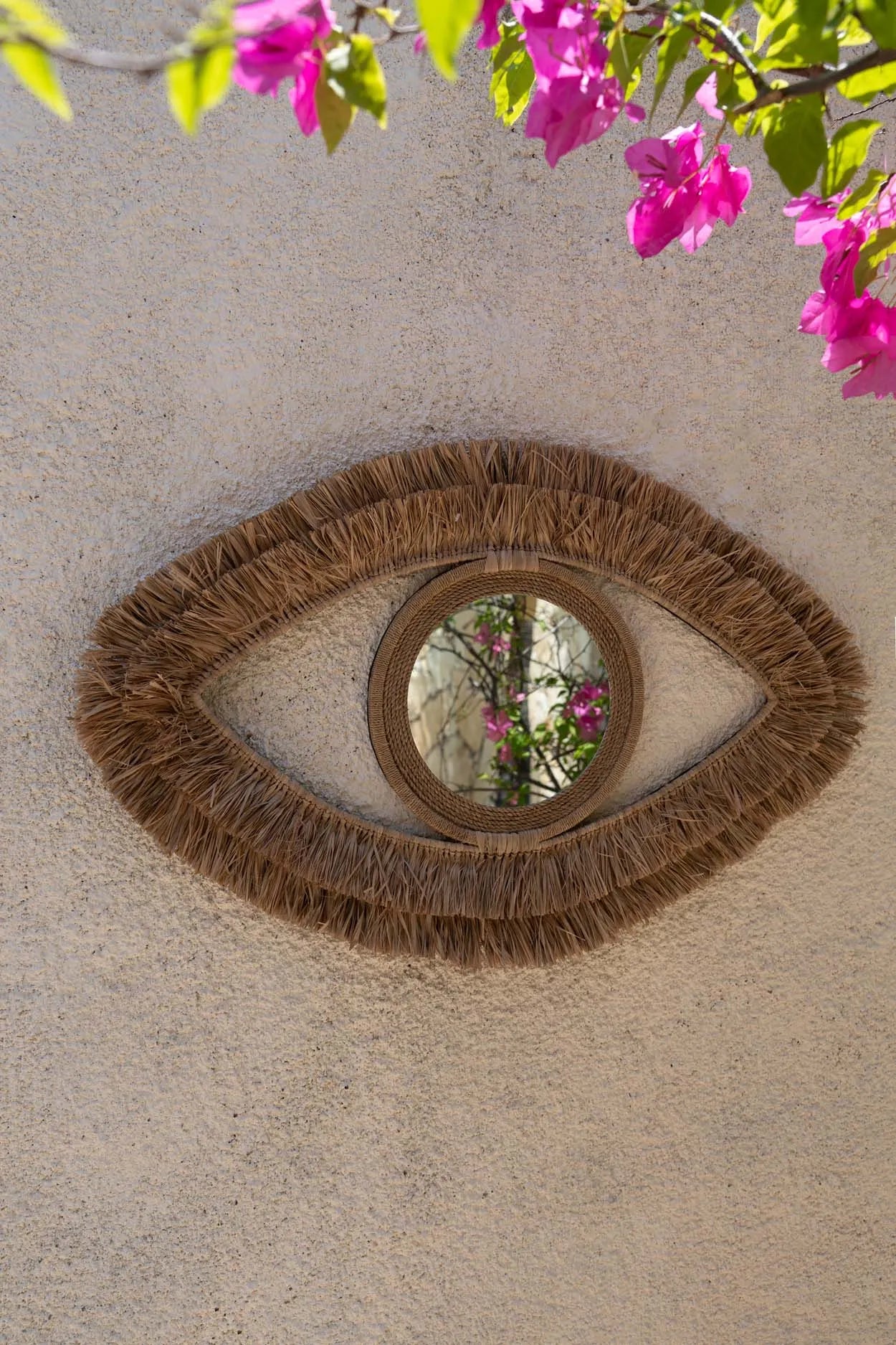 The Raffia Eye Mirror - Natural - M in raffia — handmade luxury wall mirror curated by Laiyahome — view 4