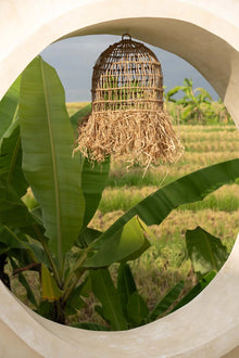 The Casita Pendant - Natural - S in grass — handmade luxury pendant lamp curated by Laiyahome — view 4