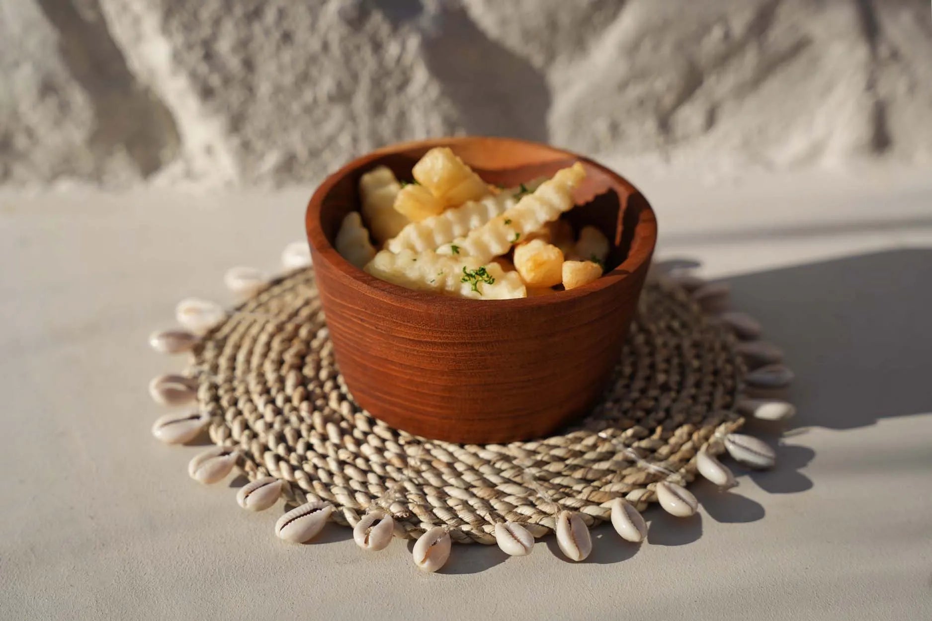 The Raffia Shell Pan Coaster in raffia — handmade luxury coaster curated by Laiyahome — view 4