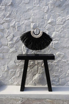 The Alang Cowrie on Stand in grass — handmade luxury standing decoration curated by Laiyahome — view 2
