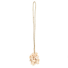 Le pompon en coquillage rose
