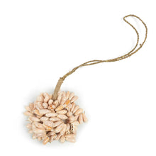 Le pompon en coquillage rose