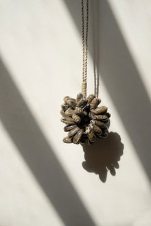 The Brown Cowrie Shell Tassel in shell — handmade luxury wall decoration curated by Laiyahome — view 2