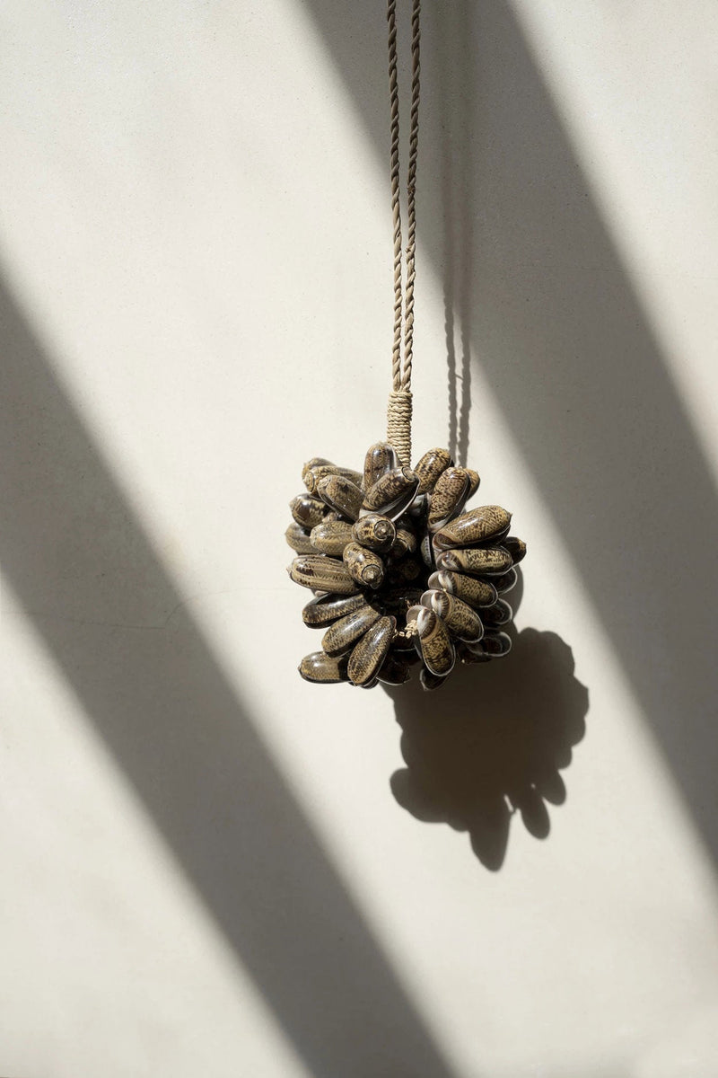 The Brown Cowrie Shell Tassel in shell — handmade luxury wall decoration curated by Laiyahome — view 2
