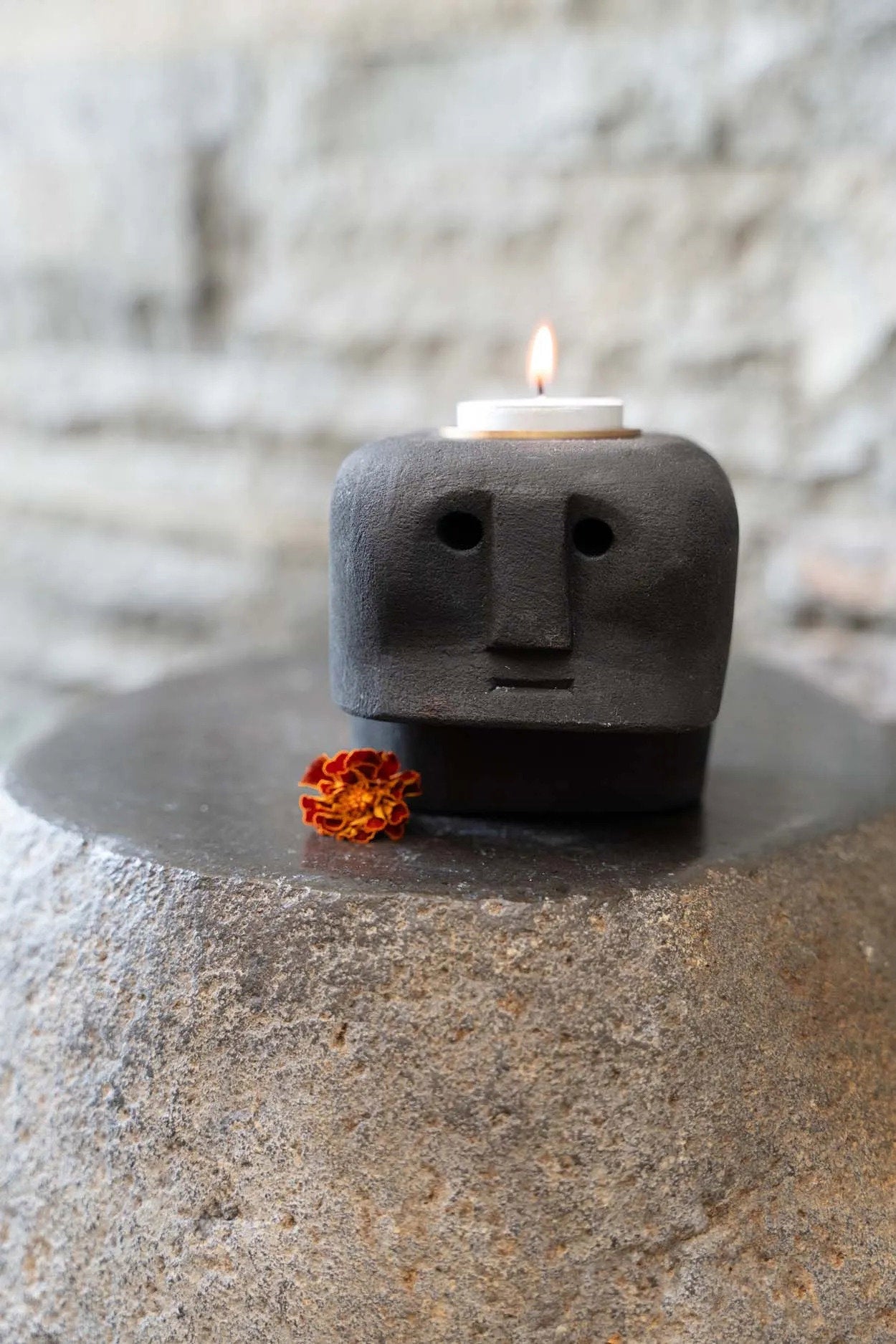 The Sumba Stone #27 Candle Holder – stone tea light holder in black – product view 2