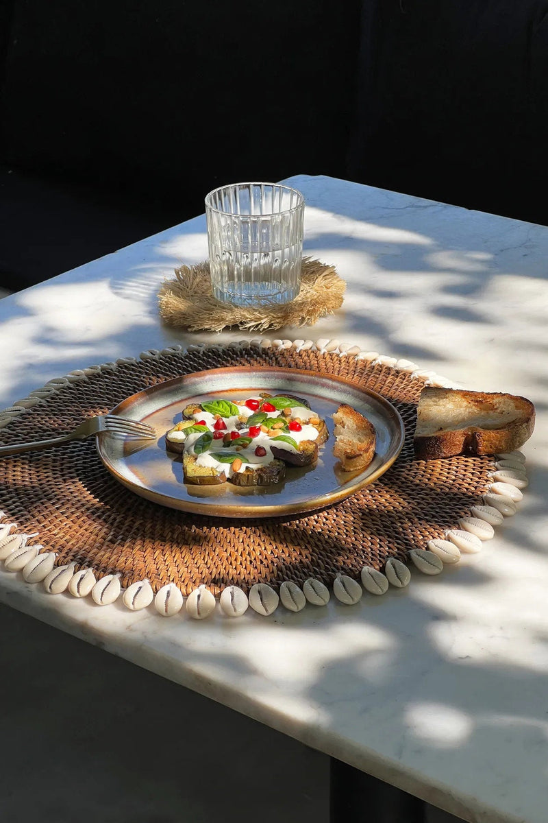 The Colonial Shell Placemat - Natural Brown – rattan placemat in natural brown – product view 2