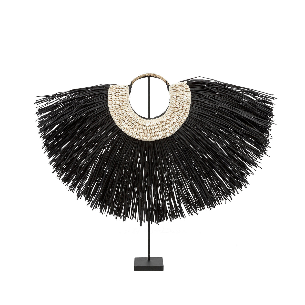 The Alang Cowrie on Stand in grass — handmade luxury standing decoration curated by Laiyahome