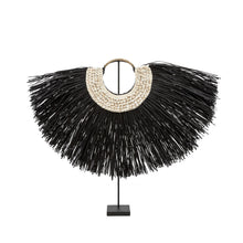 The Alang Cowrie on Stand in grass — handmade luxury standing decoration curated by Laiyahome