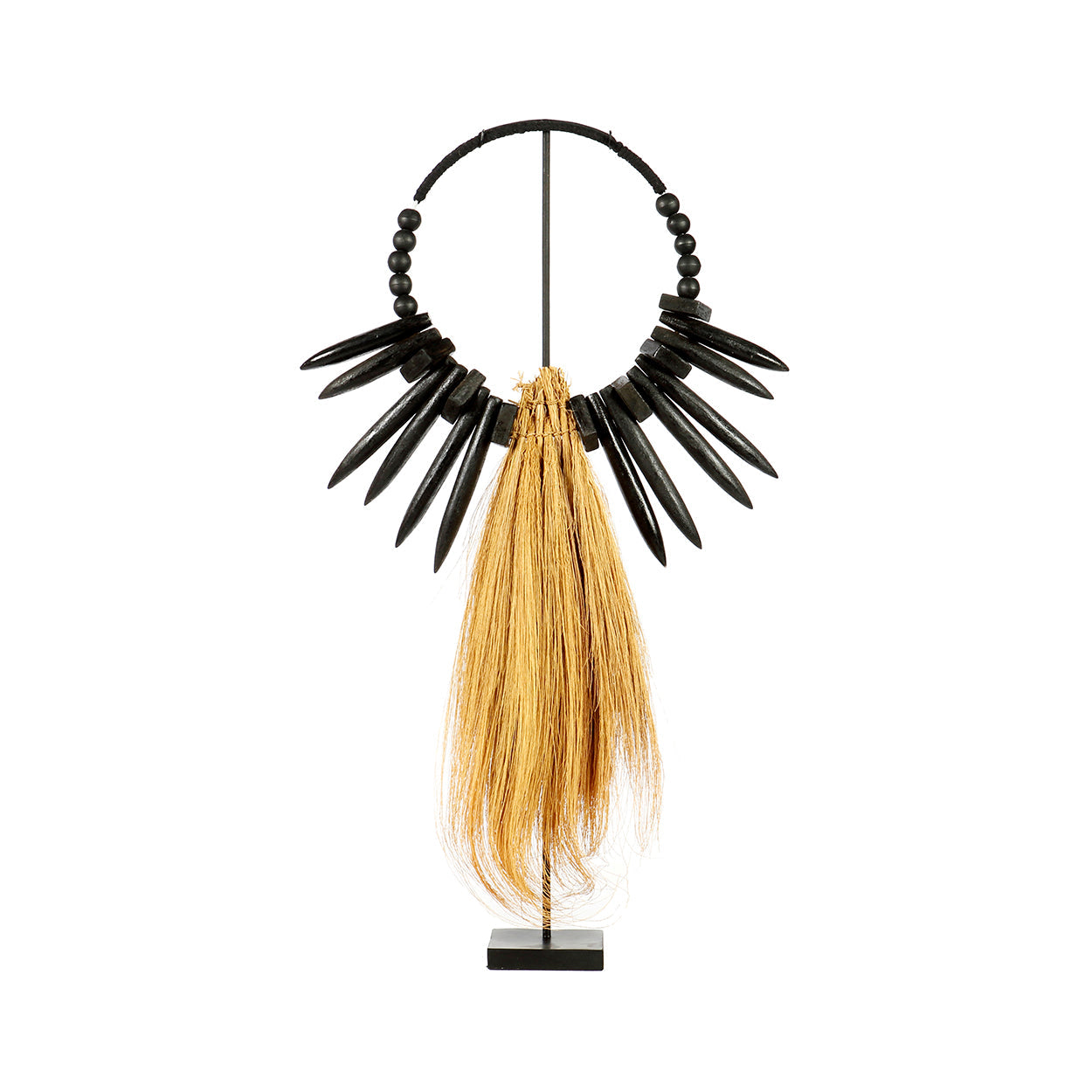 The Rayung Wood on Stand in grass — handmade luxury standing decoration curated by Laiyahome