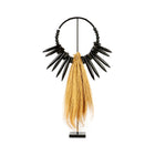 The Rayung Wood on Stand in grass — handmade luxury standing decoration curated by Laiyahome