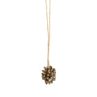 The Brown Cowrie Shell Tassel in shell — handmade luxury wall decoration curated by Laiyahome