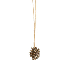 The Brown Cowrie Shell Tassel in shell — handmade luxury wall decoration curated by Laiyahome