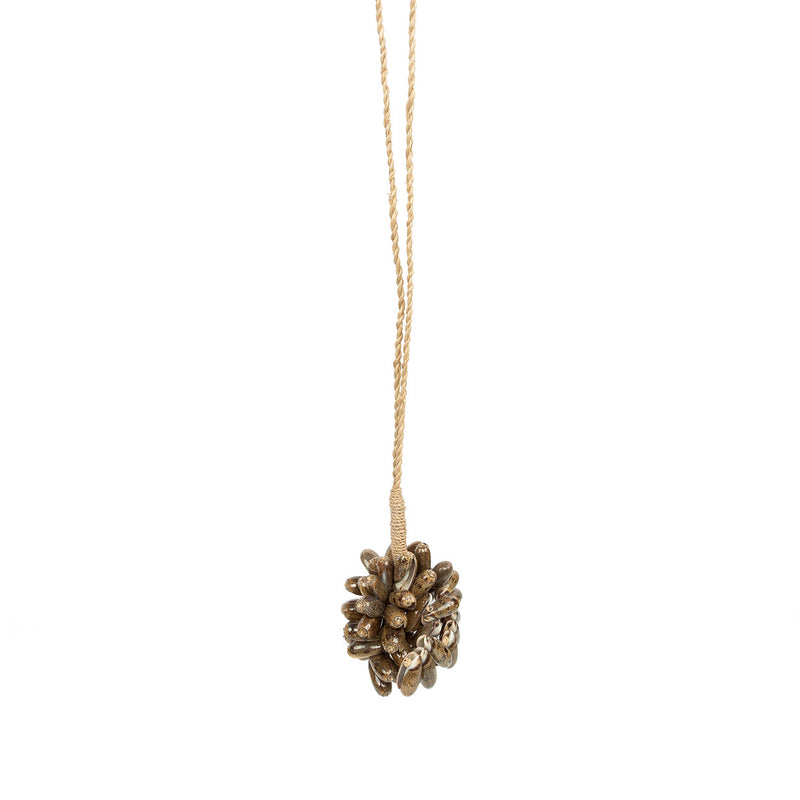 The Brown Cowrie Shell Tassel in shell — handmade luxury wall decoration curated by Laiyahome