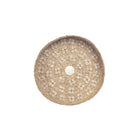 The Caribe Shell Plate - Natural White - M in grass — handmade luxury wall decoration curated by Laiyahome