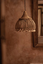 The Abaca Tassel Pendant - Natural - S in grass — handmade luxury pendant lamp curated by Laiyahome — view 2