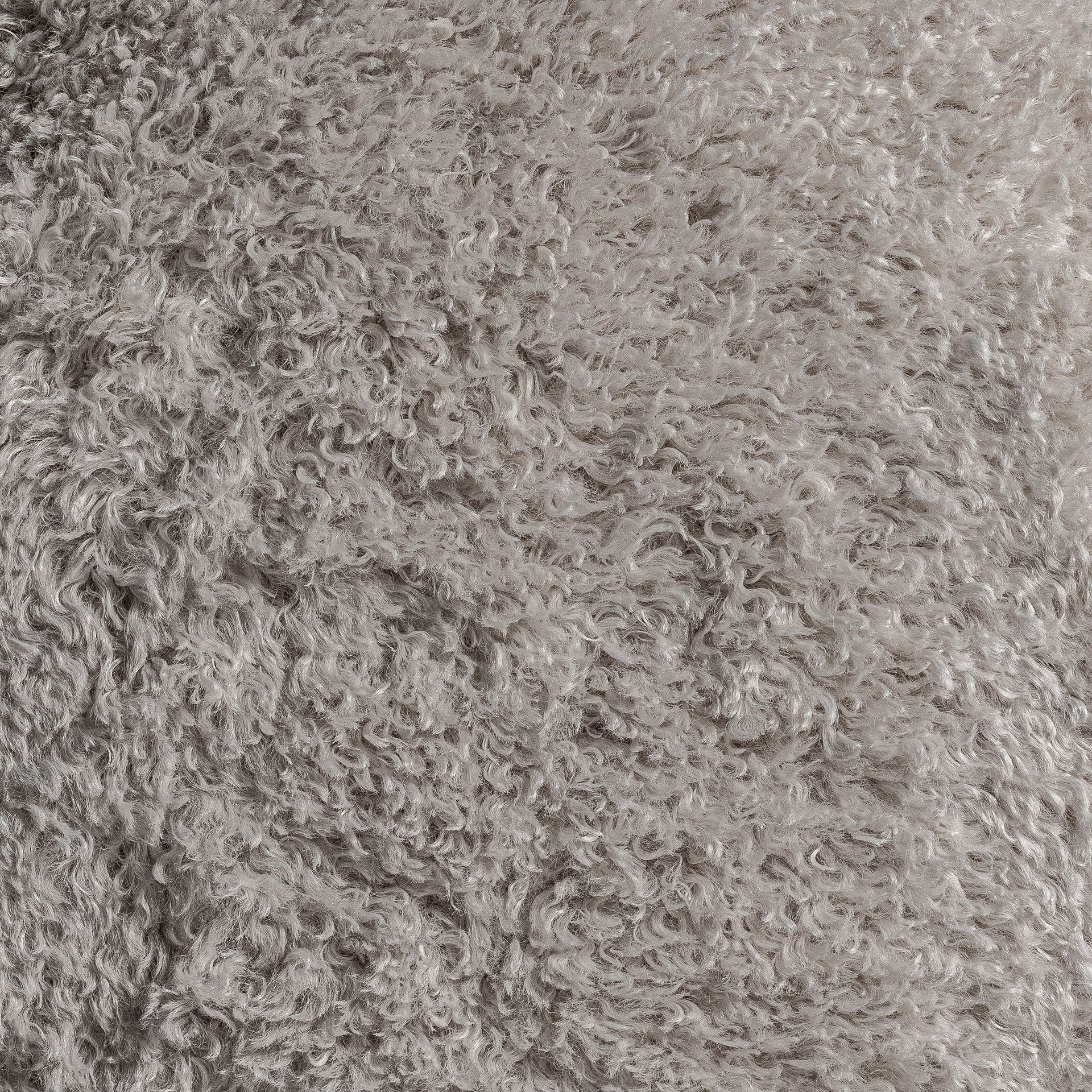The Jonzac Footrest — vintage-modern pouffe in natural wool from Laiyahome