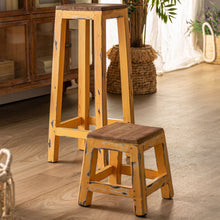 The Buzet Footrest — playful contemporary pouffe in mahogany wood from Laiyahome