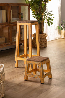 The Buzet Footrest — playful contemporary pouffe in mahogany wood from Laiyahome