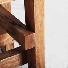 The Akviran Footrest — global-modern pouffe in mahogany wood from Laiyahome
