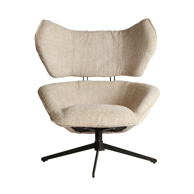 BOUCLÉ PRIVAS ROTATIVE ARMCHAIR in a modern interior setting