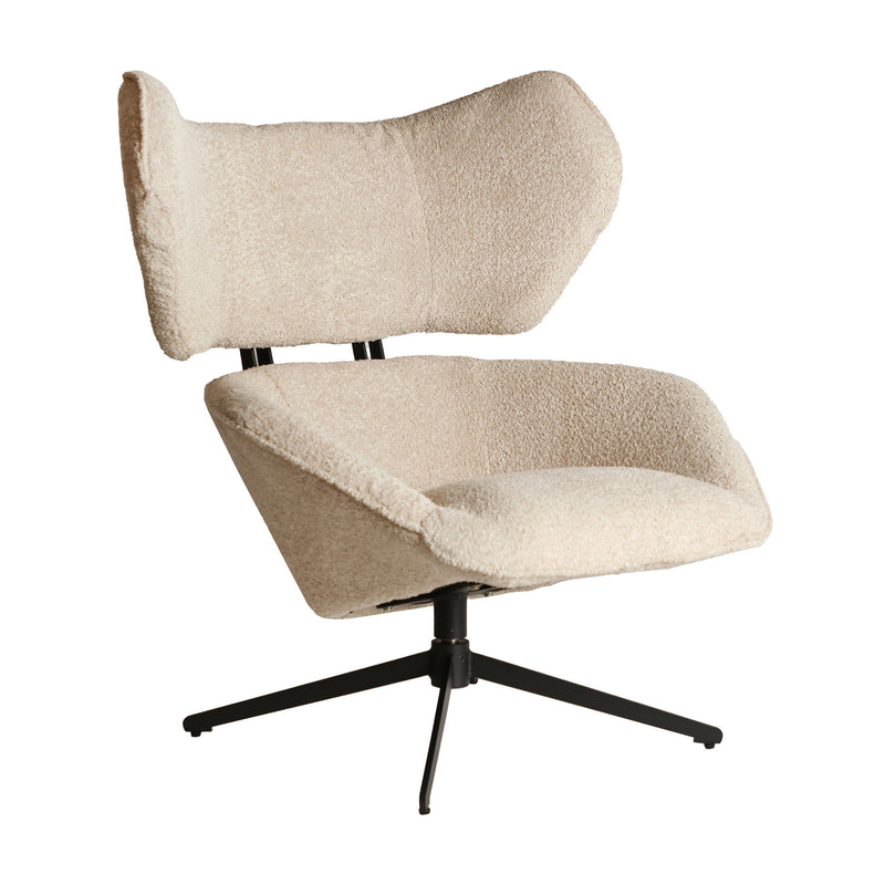 BOUCLÉ PRIVAS ROTATIVE ARMCHAIR in a modern interior setting