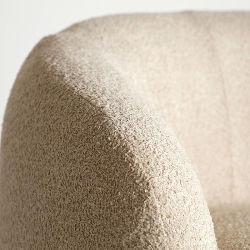BOUCLÉ PRIVAS ARMCHAIR in a modern interior setting