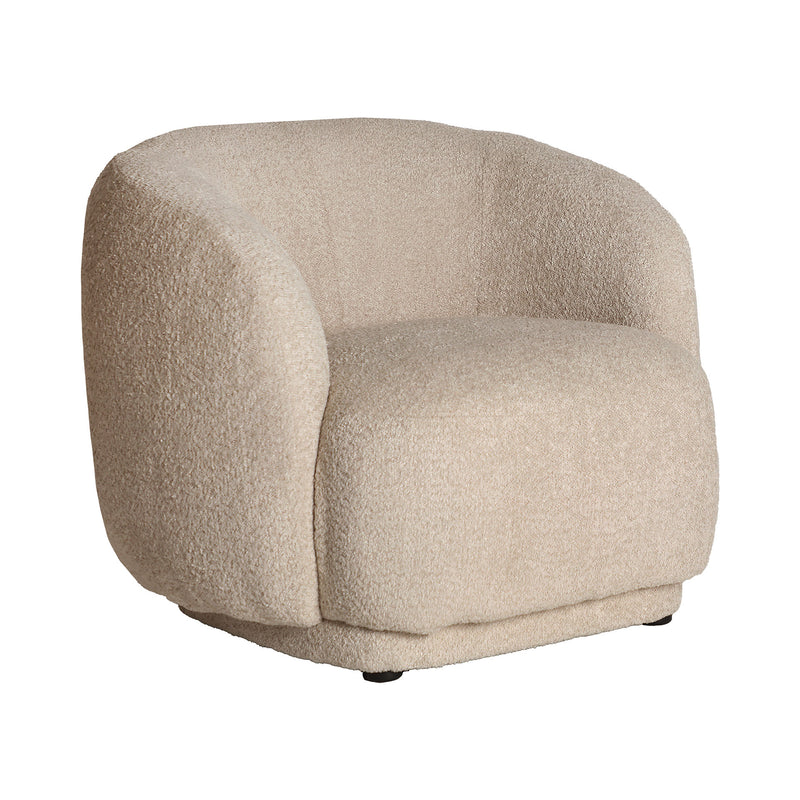BOUCLÉ PRIVAS ARMCHAIR in a modern interior setting