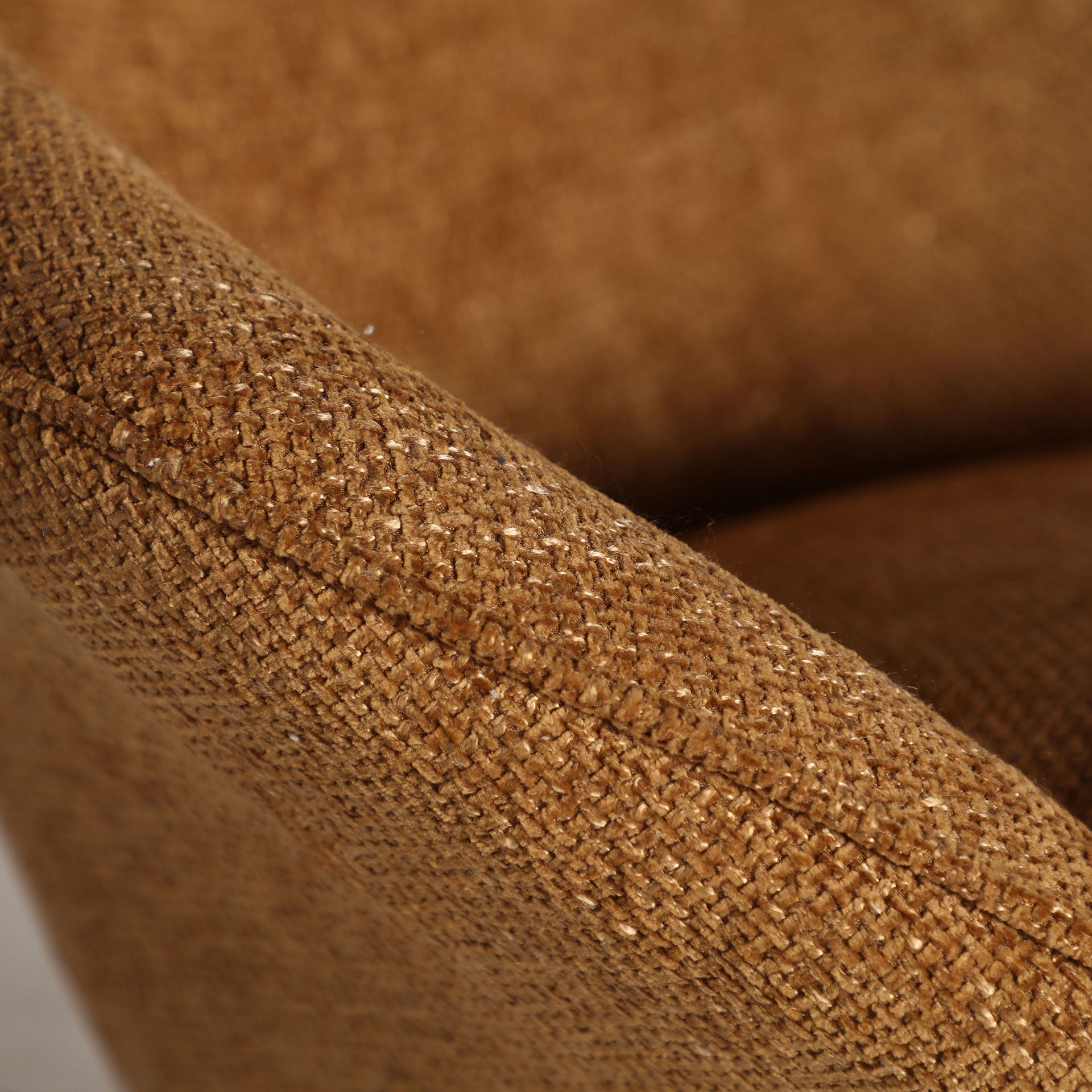 PRIVAS ROTATIVE ARMCHAIR in a modern interior setting