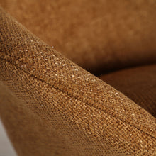 PRIVAS ROTATIVE ARMCHAIR in a modern interior setting