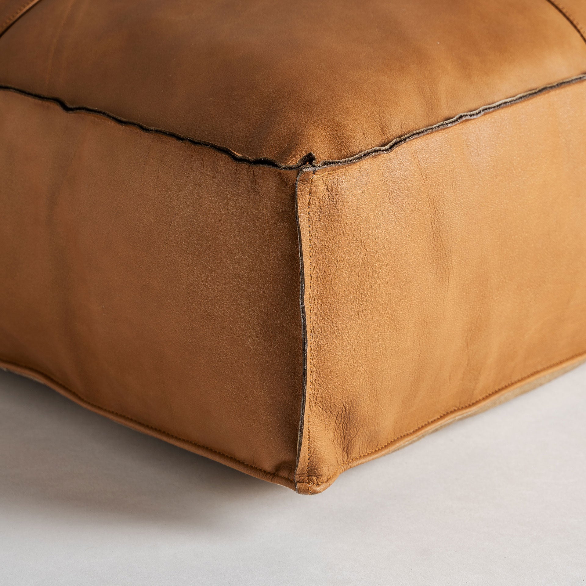The Boussac Puff — vintage pouffe in natural leather from Laiyahome