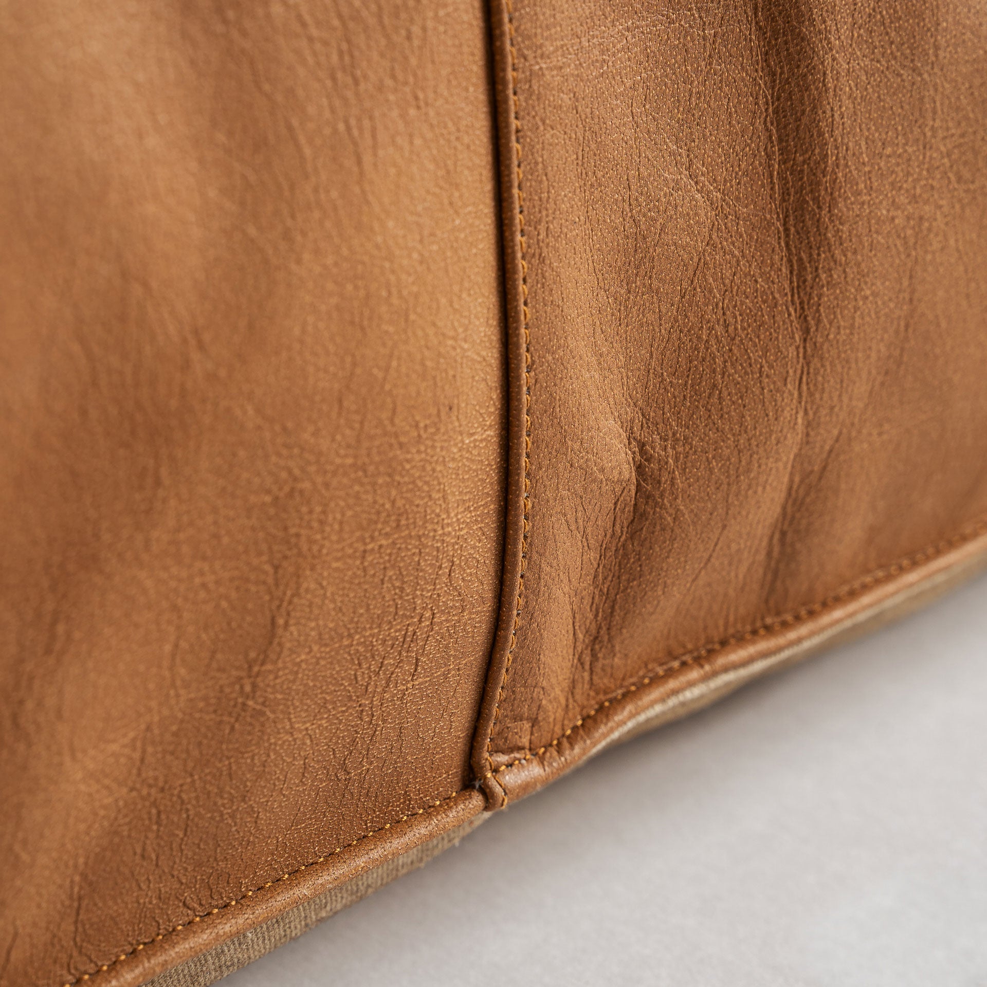 The Boussac Puff — vintage pouffe in natural leather from Laiyahome