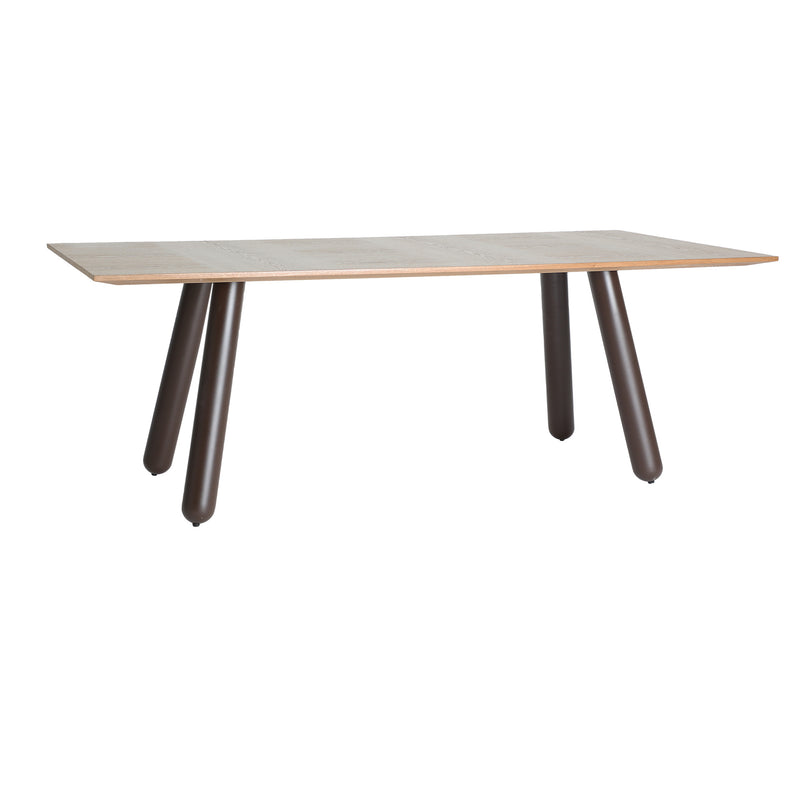 ORBE DINING TABLE in a modern interior setting