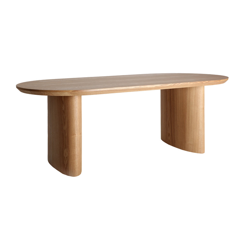 SOMA DINING TABLE in a modern interior setting